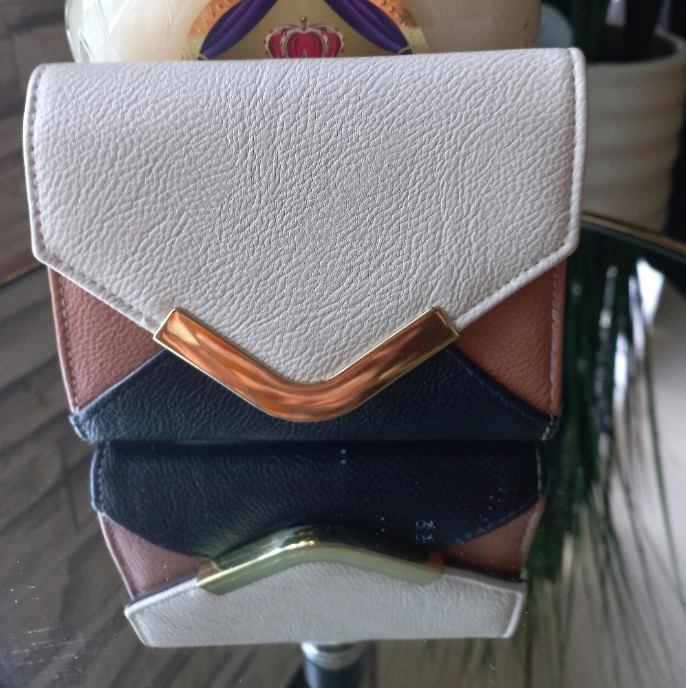 Beautiful cream, carmel and black tri fold wallet
